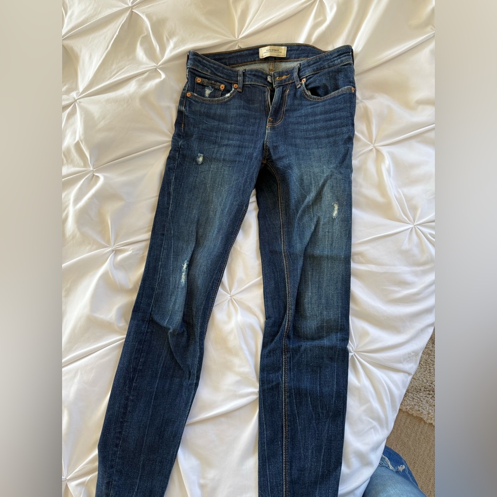 Blue Skinny Jeans with Distressed Details